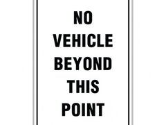 NO VEHICLE BEYOND THIS POINT SIGN