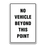 NO VEHICLE BEYOND THIS POINT SIGN